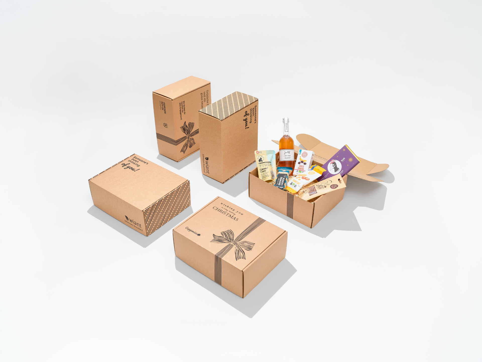 Gebrandete WIANT Geschenkboxen mit Logo und Grusskarte