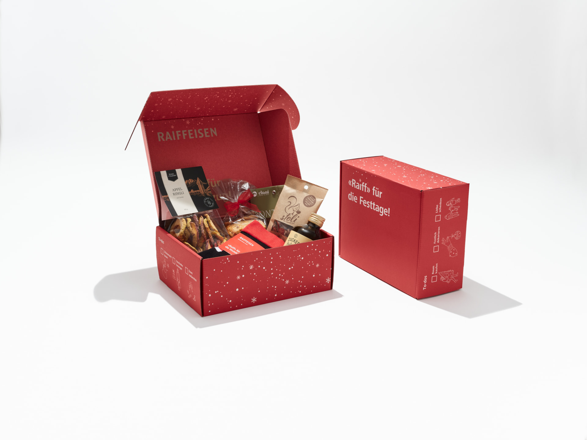 Raiffeisen Weihnachtsbox mit personalisierten Kundenprodukten
