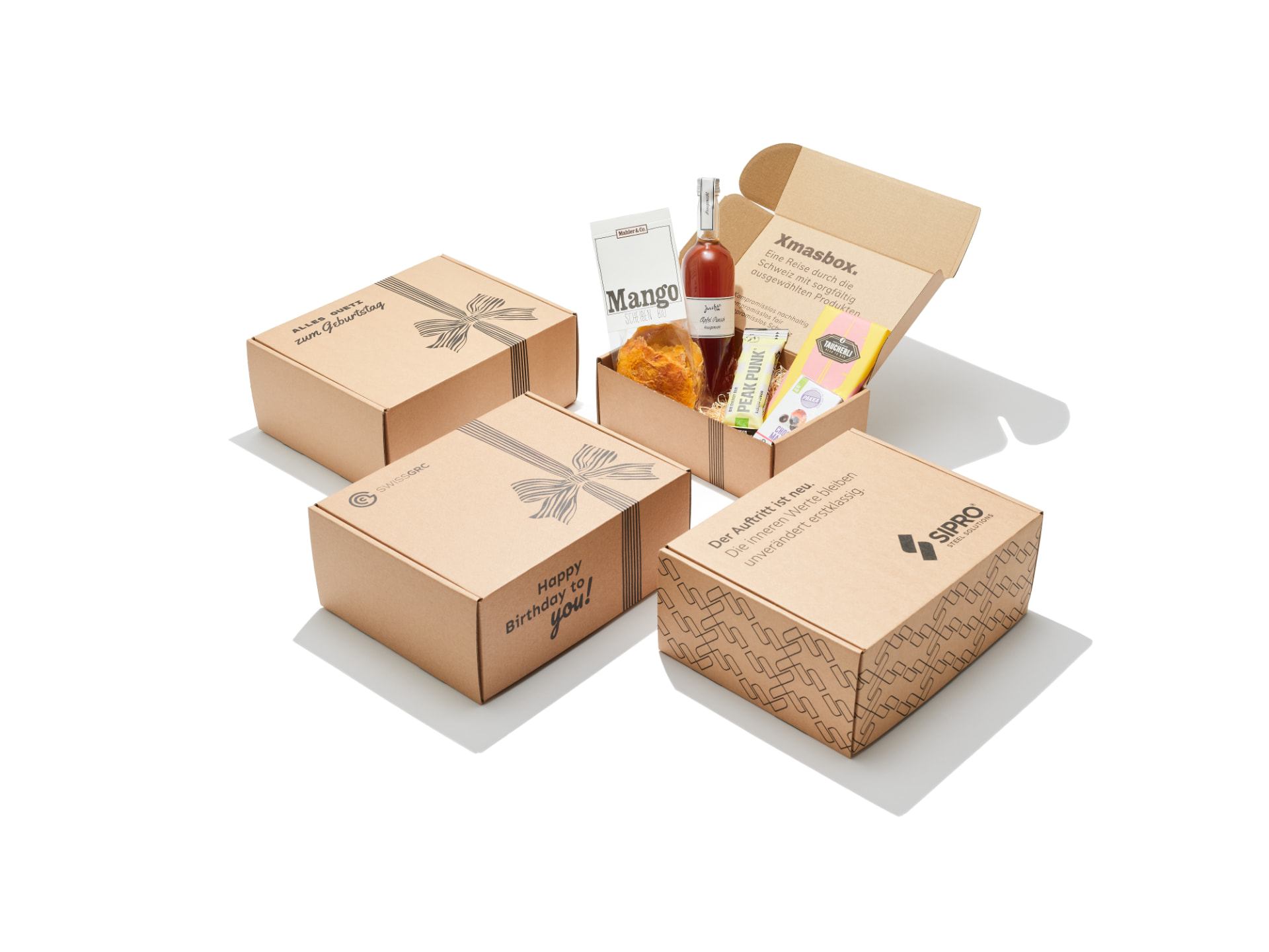Mehrere personalisierte Geschenkboxen mit Firmenlogo