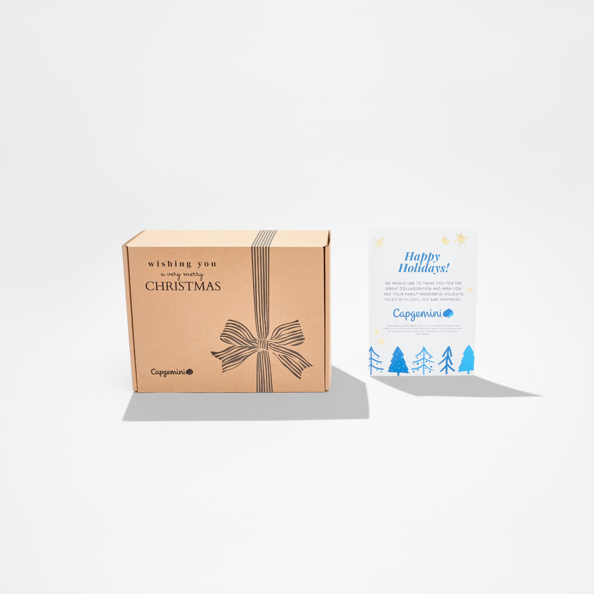 Weihnachtsbox mit Capgemini-Logo und individuell gestalteter Grusskarte